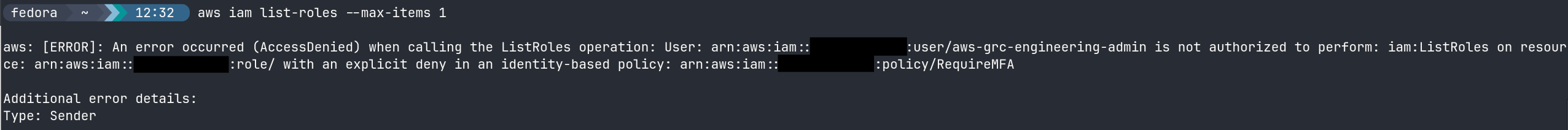 CloudShell showing aws iam list-roles run with the admin's long-term access key returning AccessDenied, with the account ID blacked out in the user, role, and policy ARNs of the error message.
