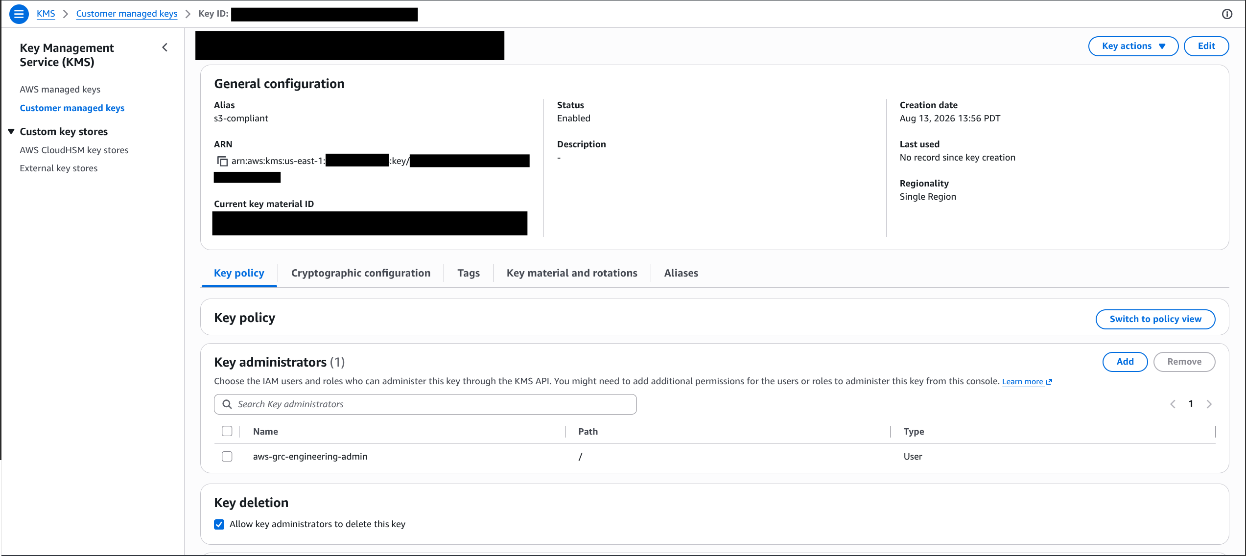 AWS KMS customer-managed key detail page for alias/s3-compliant, showing the key policy's key administrators, with the key ID and ARN blacked out.